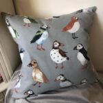 Grey bird cushion